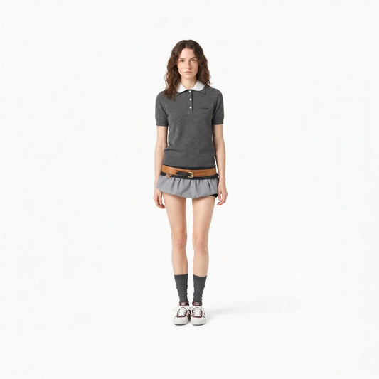 Miu Miu collared cashmere polo sweater in grey, full-length view on model — The Quiet Edition