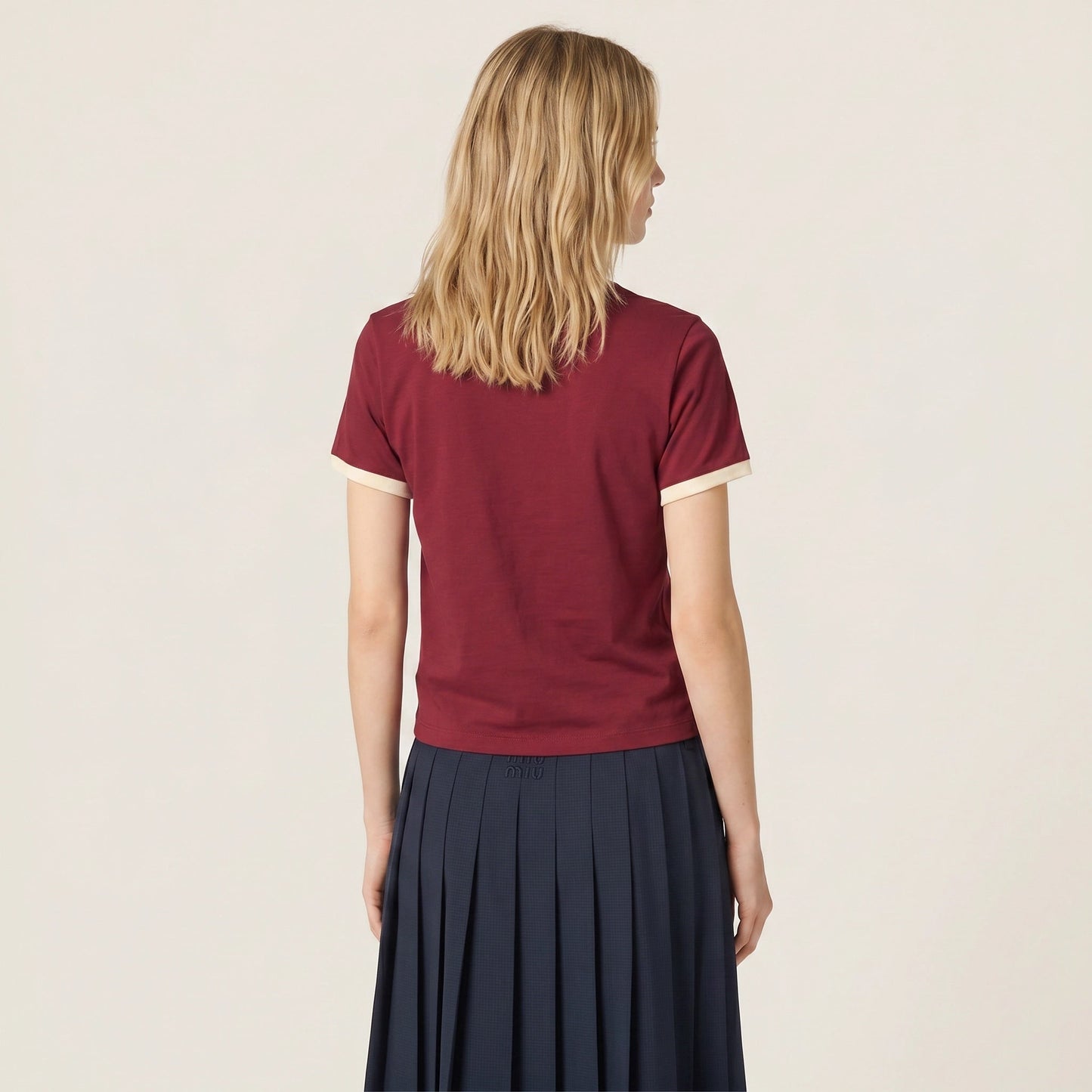 Miu Miu logo cotton t-shirt in burgundy, back view on model — The Quiet Edition