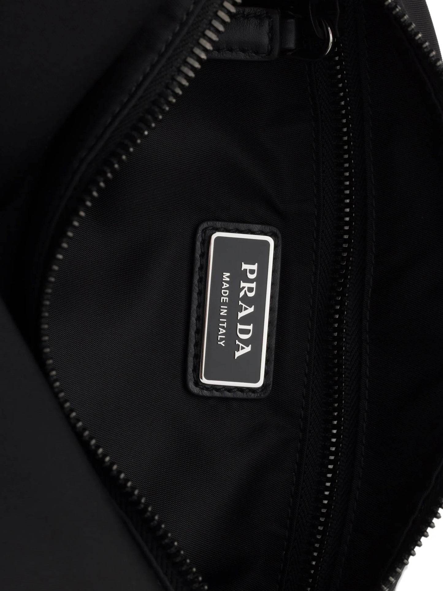 Prada Explore Re-Nylon hobo bag in black, interior Made in Italy label — The Quiet Edition