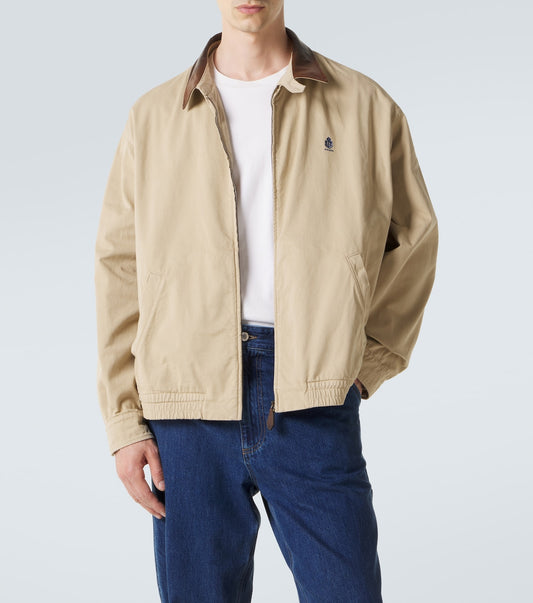 Prada Leather-Trimmed Cotton Blouson Jacket in beige, worn front view — The Quiet Edition