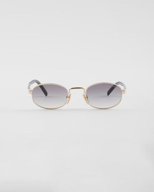 Prada PR B53 oval sunglasses in pale gold, front product view — The Quiet Edition