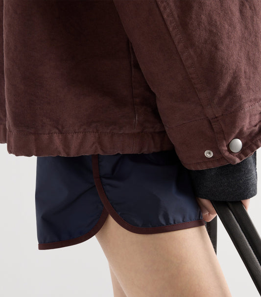 Prada Re-Nylon Shorts — Blue in Blue, side — The Quiet Edition