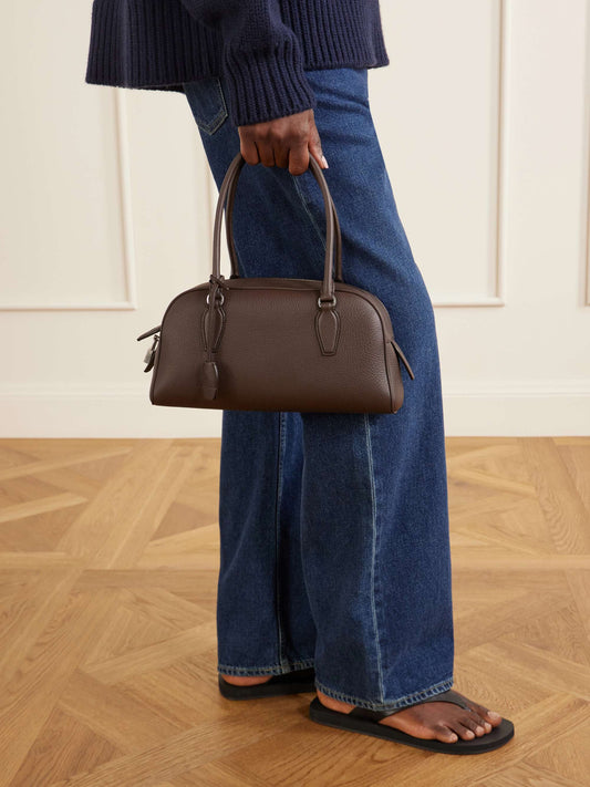 The Row Small E/W India Bag in Dark Brown, side view | The Quiet Edition