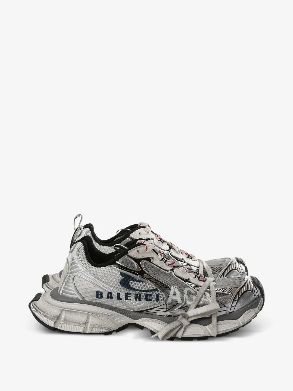 Balenciaga 3XL Split Logo Sneakers in white, side profile showing the split Balenciaga print and worn-effect sole