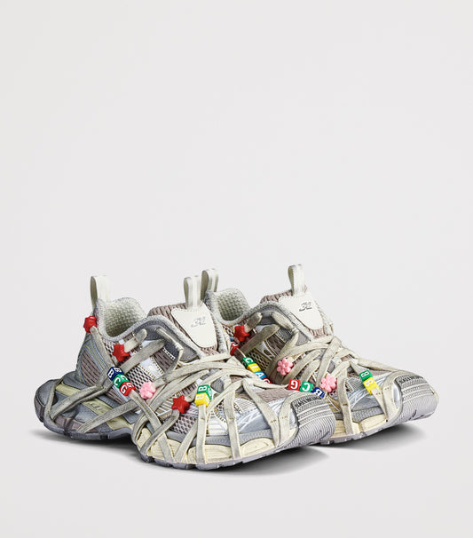 Balenciaga Distressed 3XL Extreme Lace Sneakers pair angled front view with letter bead lace charms