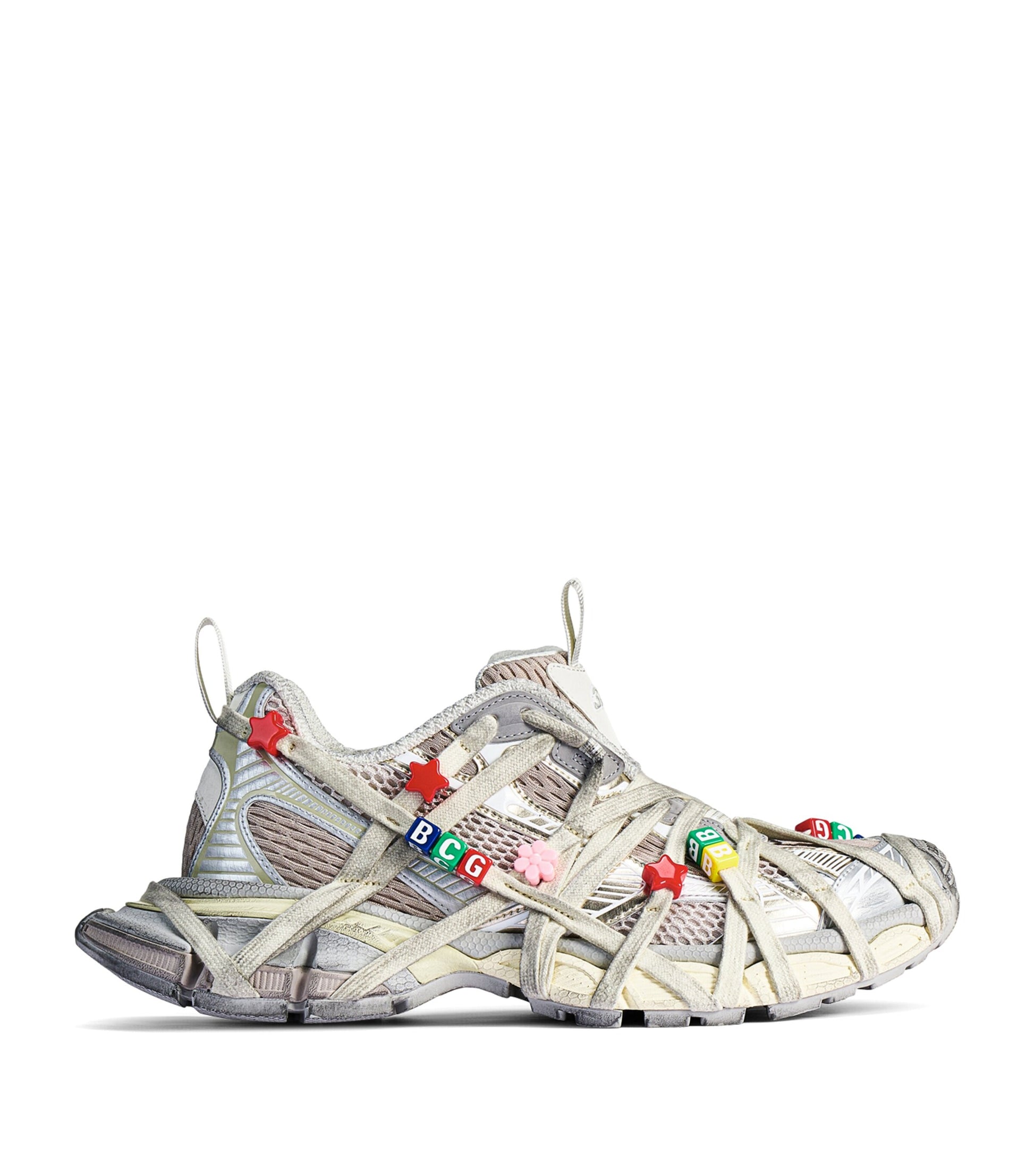 Balenciaga Distressed 3XL Extreme Lace Sneaker side profile in cream and taupe with beaded laces
