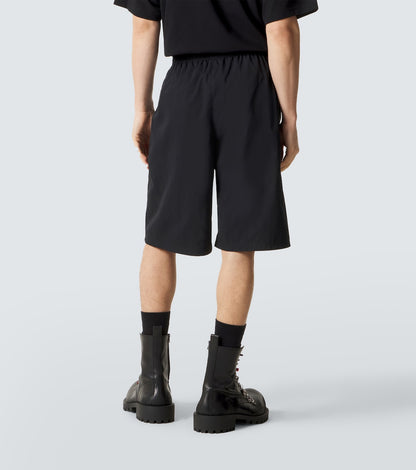 Balenciaga Jersey Bermuda Shorts in Black, angle — The Quiet Edition