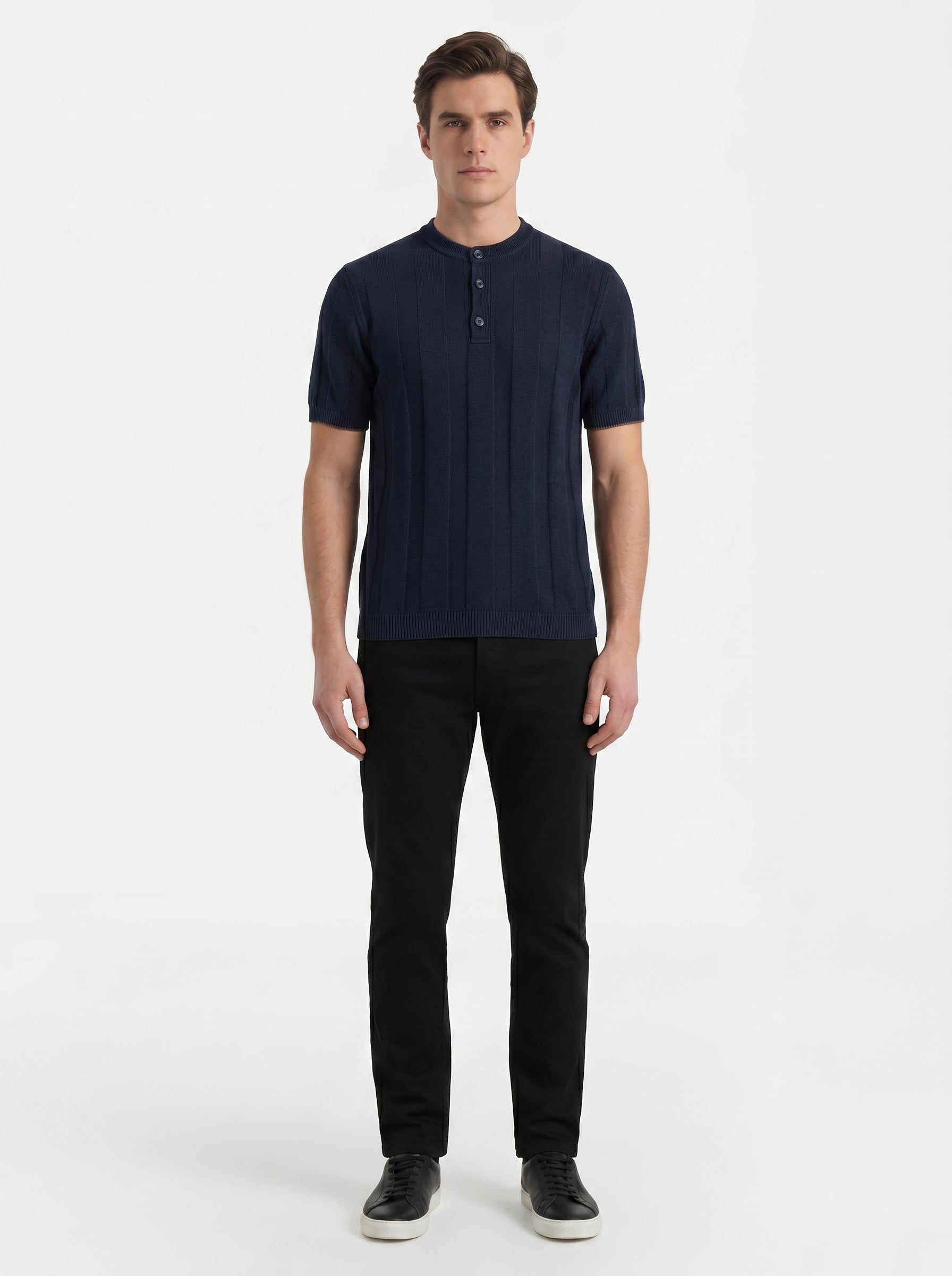 Brunello Cucinelli linen-blend knit t-shirt in navy, model front — The Quiet Edition