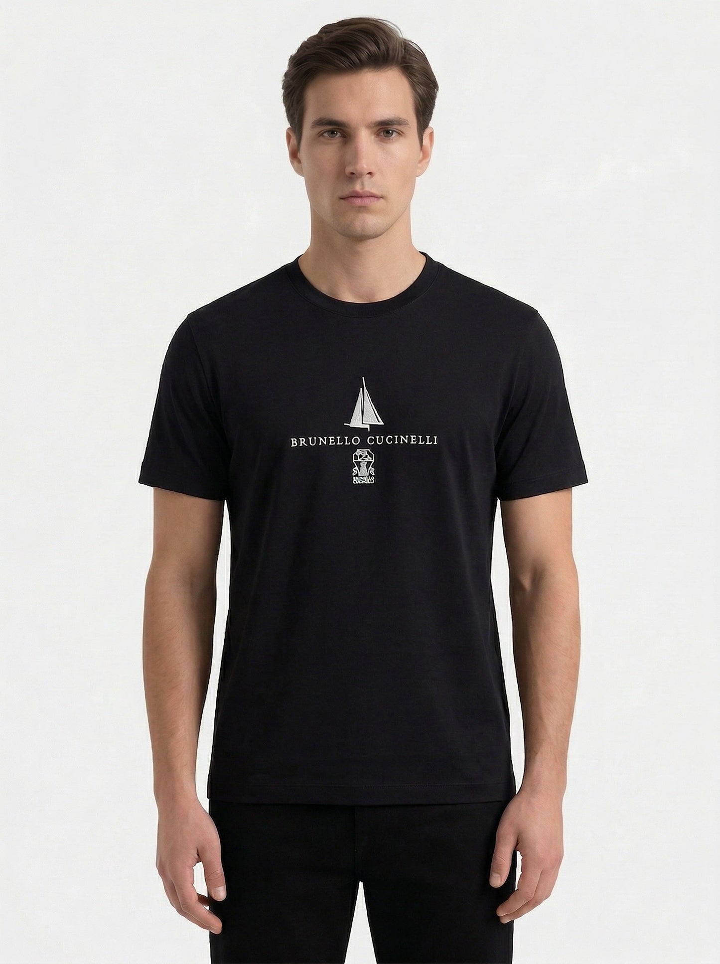 Brunello Cucinelli logo print t-shirt in black, model front — The Quiet Edition