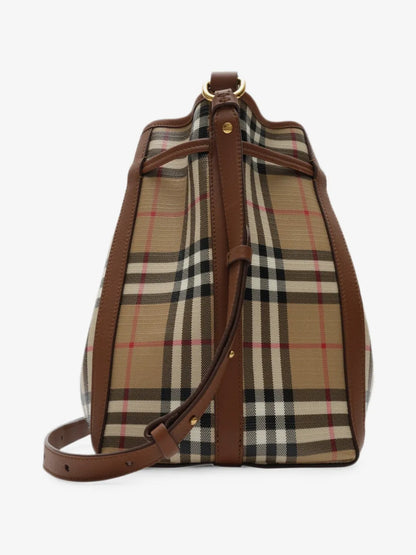 Burberry Mini Check Bucket Bag side profile showing leather trims and adjustable strap