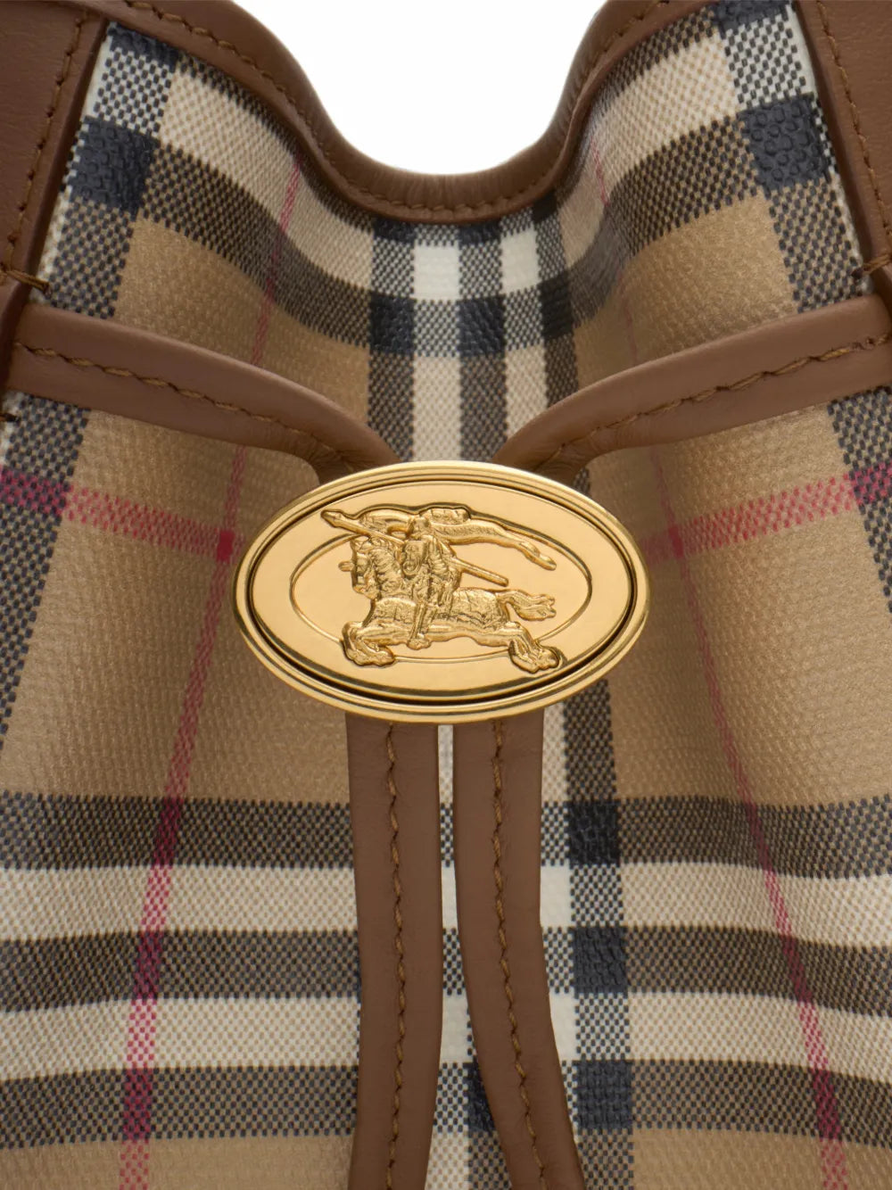 Burberry Mini Check Bucket Bag detail of the gold Equestrian Knight medallion and leather drawstring