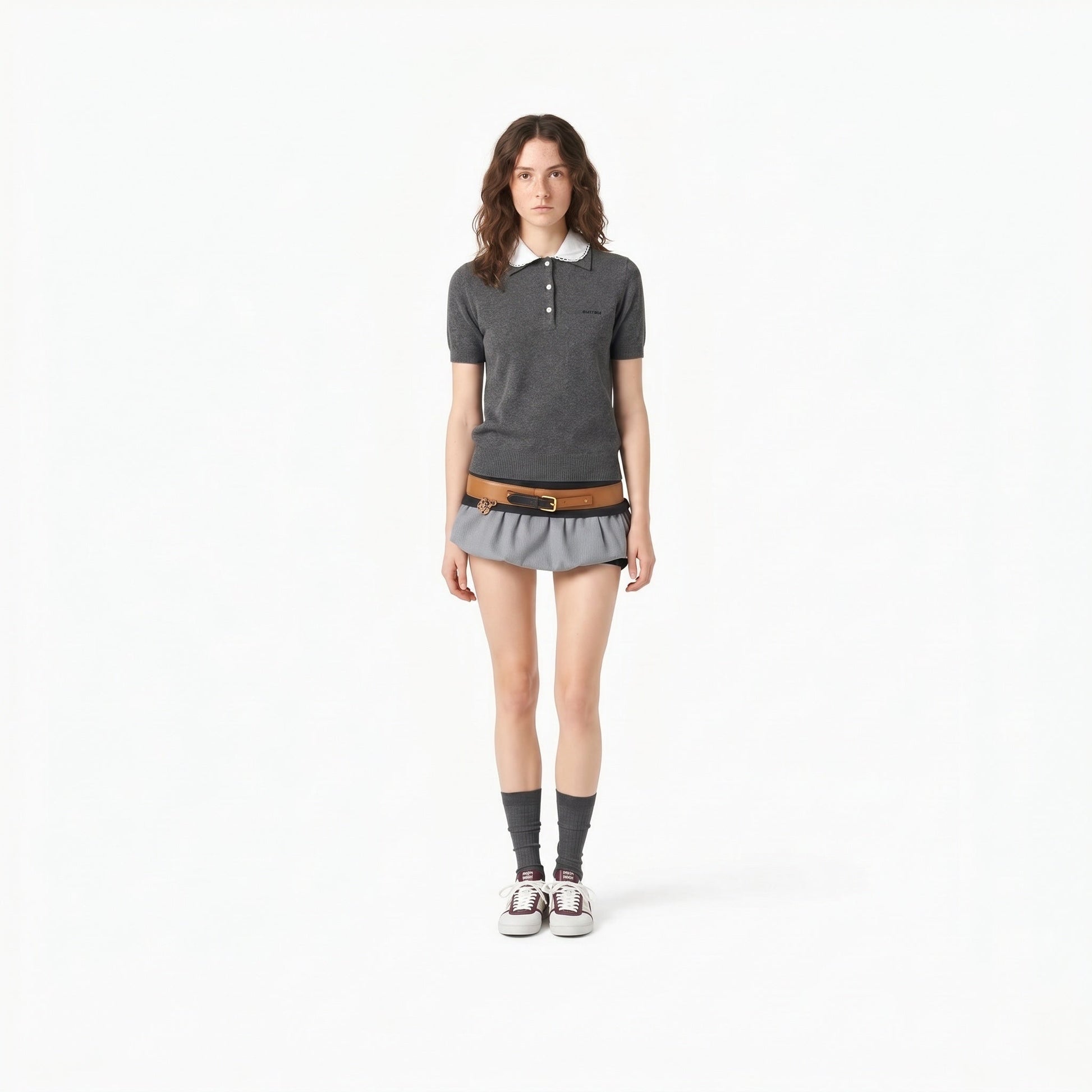 Miu Miu collared cashmere polo sweater in grey, full-length view on model — The Quiet Edition