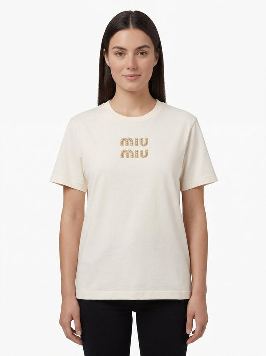 Miu Miu embroidered logo t-shirt in white, model front — The Quiet Edition