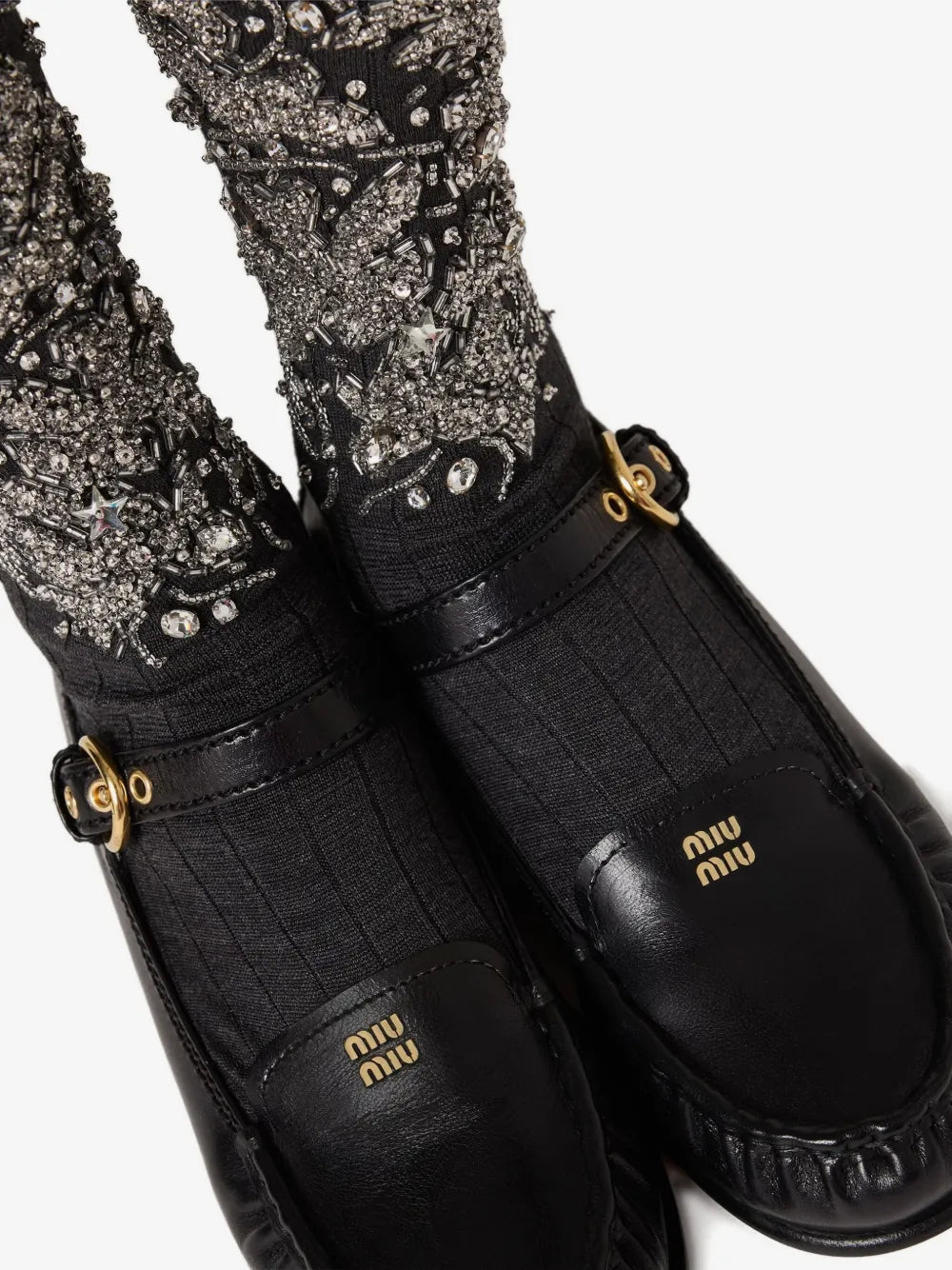 Miu Miu Leather Loafers with Strap in Black, worn detail with embellished socks — The Quiet Edition