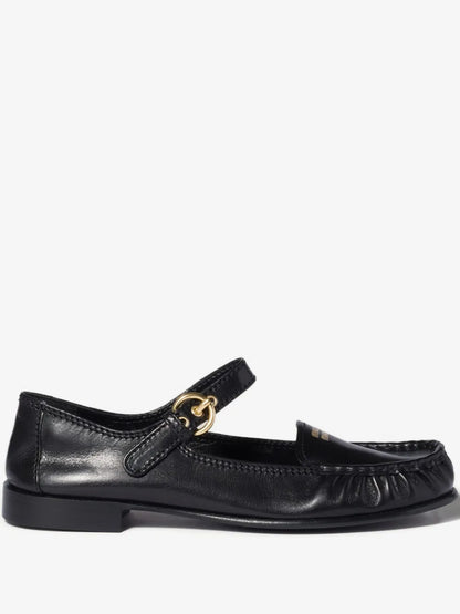 Miu Miu Leather Loafers with Strap in Black, side view — The Quiet Edition