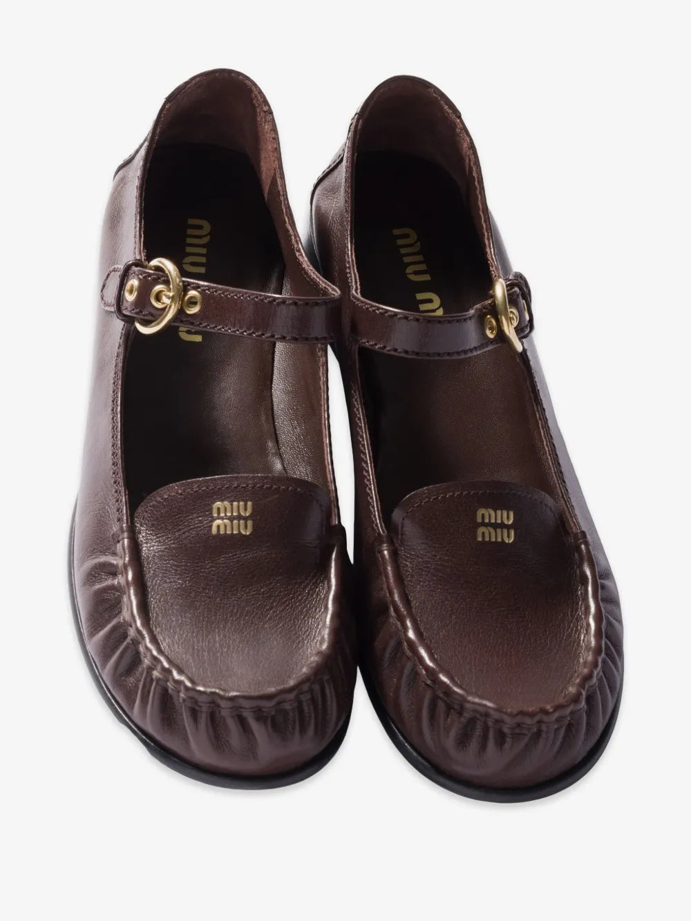 Miu Miu Leather Loafers with Strap in Brown, top view of the pair — The Quiet Edition