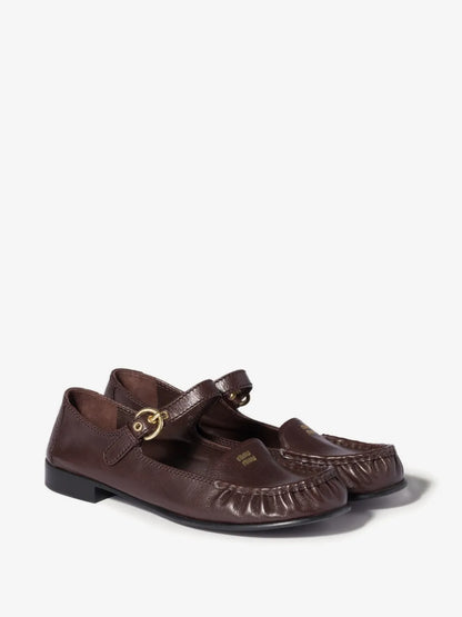 Miu Miu Leather Loafers with Strap in Brown, three-quarter angle view of the pair — The Quiet Edition