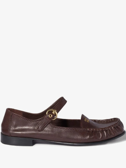 Miu Miu Leather Loafers with Strap in Brown, side view — The Quiet Edition