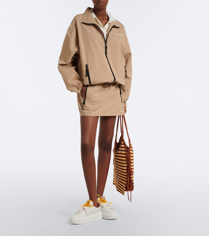 Miu Miu Leather Platform Sneakers in White, angle — The Quiet Edition