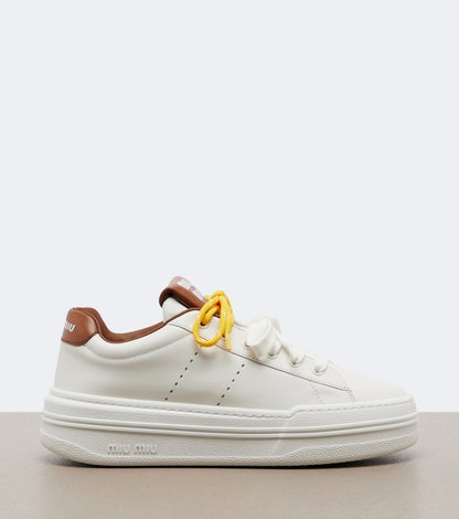 Miu Miu Leather Platform Sneakers in White, detail — The Quiet Edition