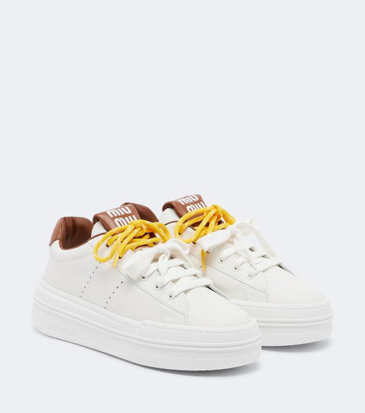 Miu Miu Leather Platform Sneakers in White, front — The Quiet Edition