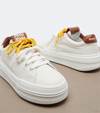 Miu Miu Leather Platform Sneakers in White, interior — The Quiet Edition