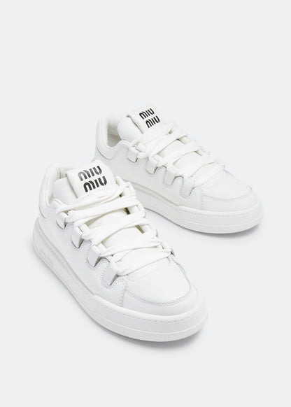 Miu Miu Leather Sneakers in White, angle — The Quiet Edition