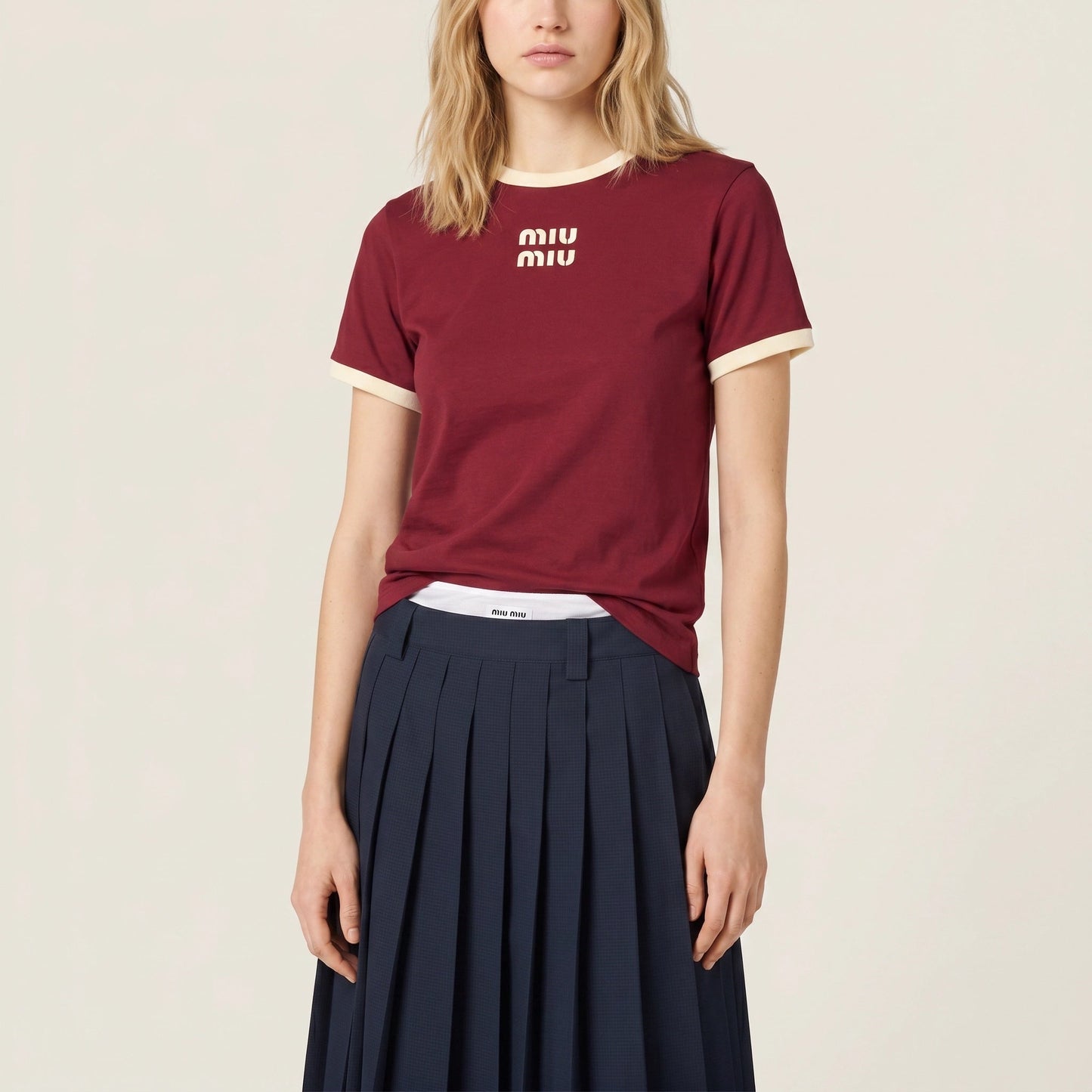 Miu Miu logo cotton t-shirt in burgundy, front view on model — The Quiet Edition