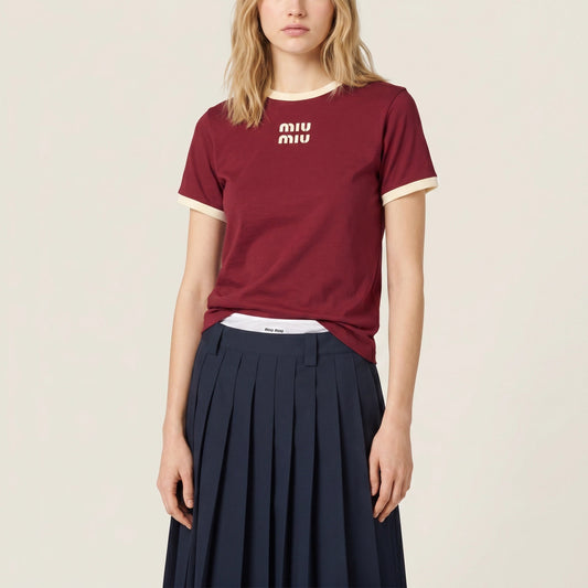 Miu Miu logo cotton t-shirt in burgundy, front view on model — The Quiet Edition