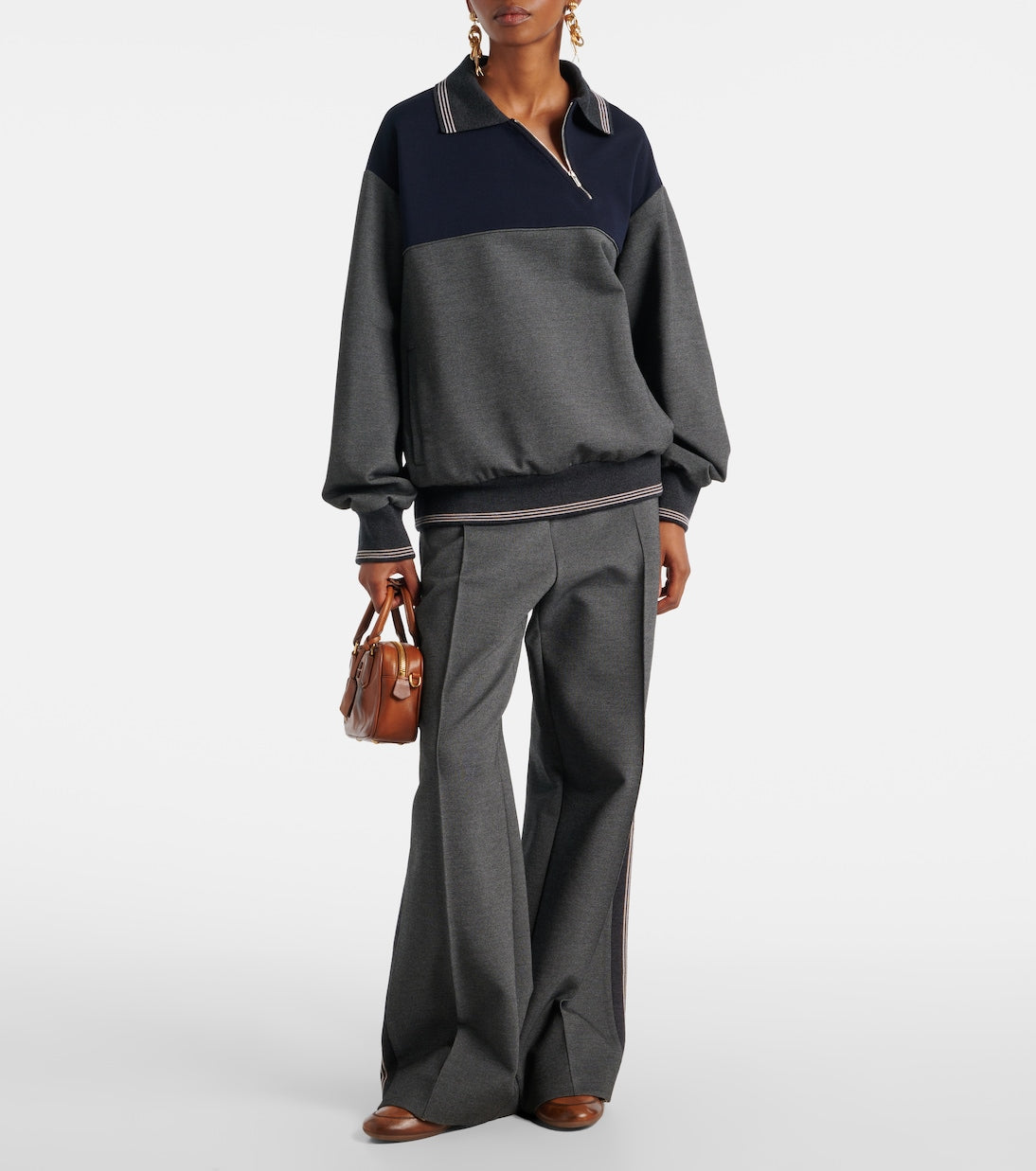 Miu Miu Logo Leather Sneakers in brown, worn full-length view