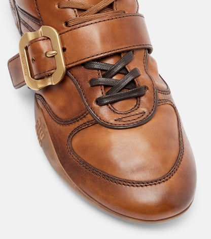 Miu Miu Logo Leather Sneakers in brown, buckle and toe detail