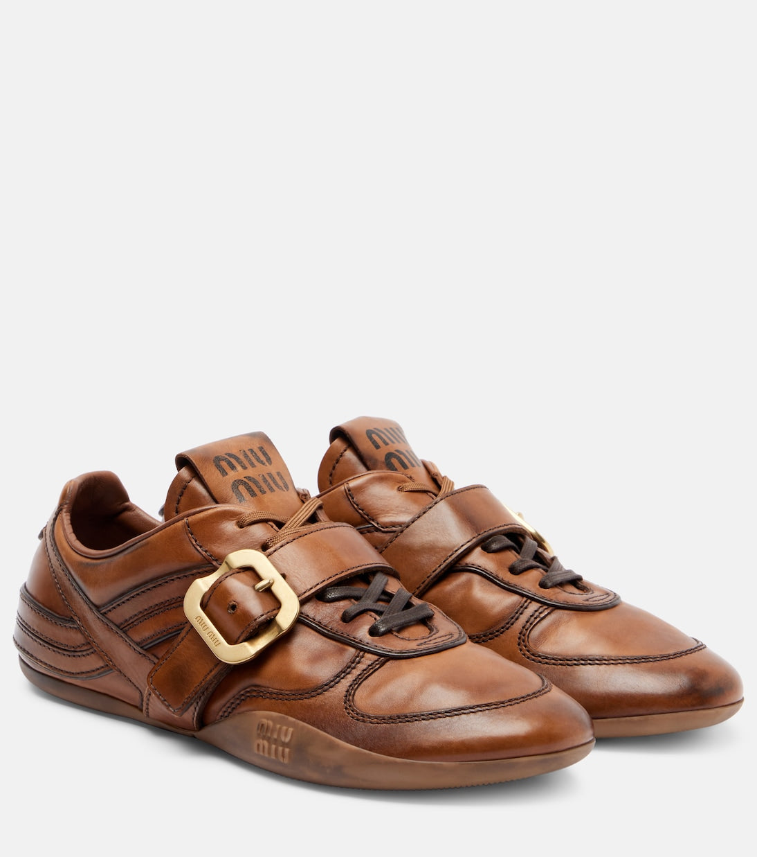 Miu Miu Logo Leather Sneakers in brown, three-quarter front view