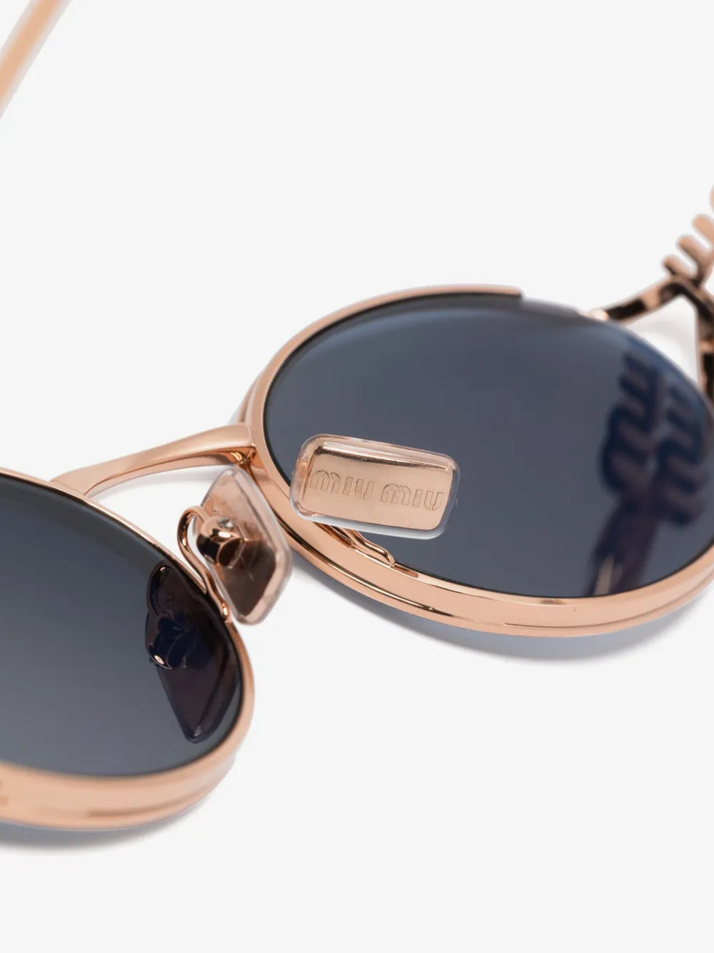 Miu Miu Oval-Frame Sunglasses in Blue, side — The Quiet Edition