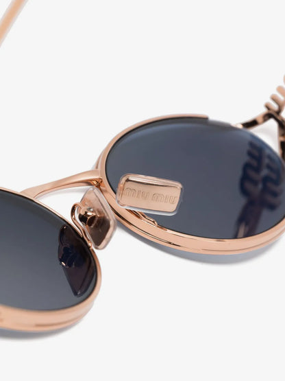 Miu Miu Oval-Frame Sunglasses in Blue, side — The Quiet Edition