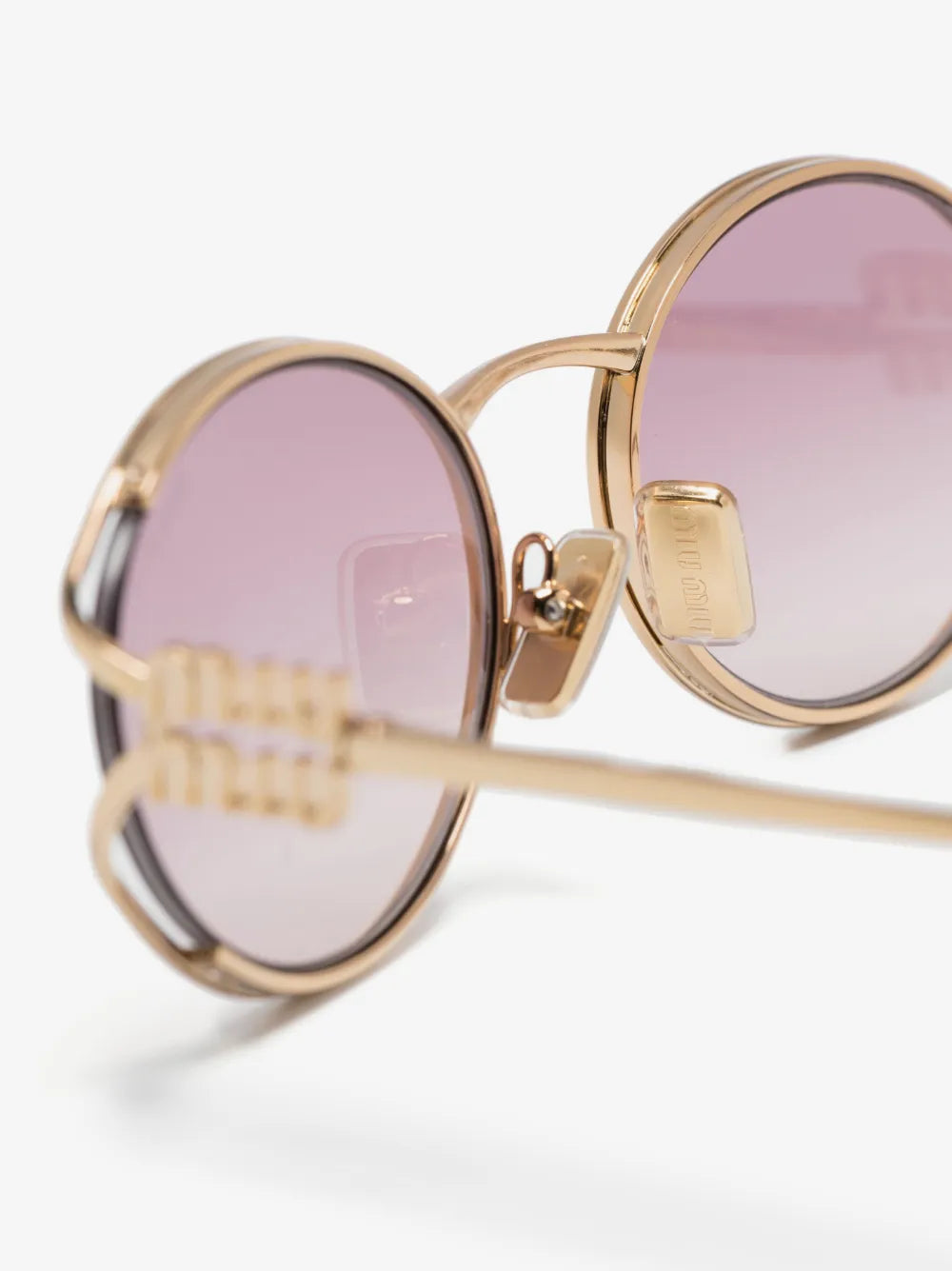 Miu Miu Oval-Frame Sunglasses in Pink, side — The Quiet Edition
