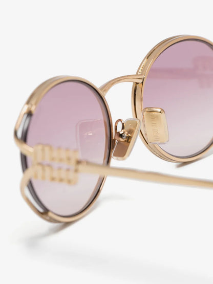 Miu Miu Oval-Frame Sunglasses in Pink, side — The Quiet Edition