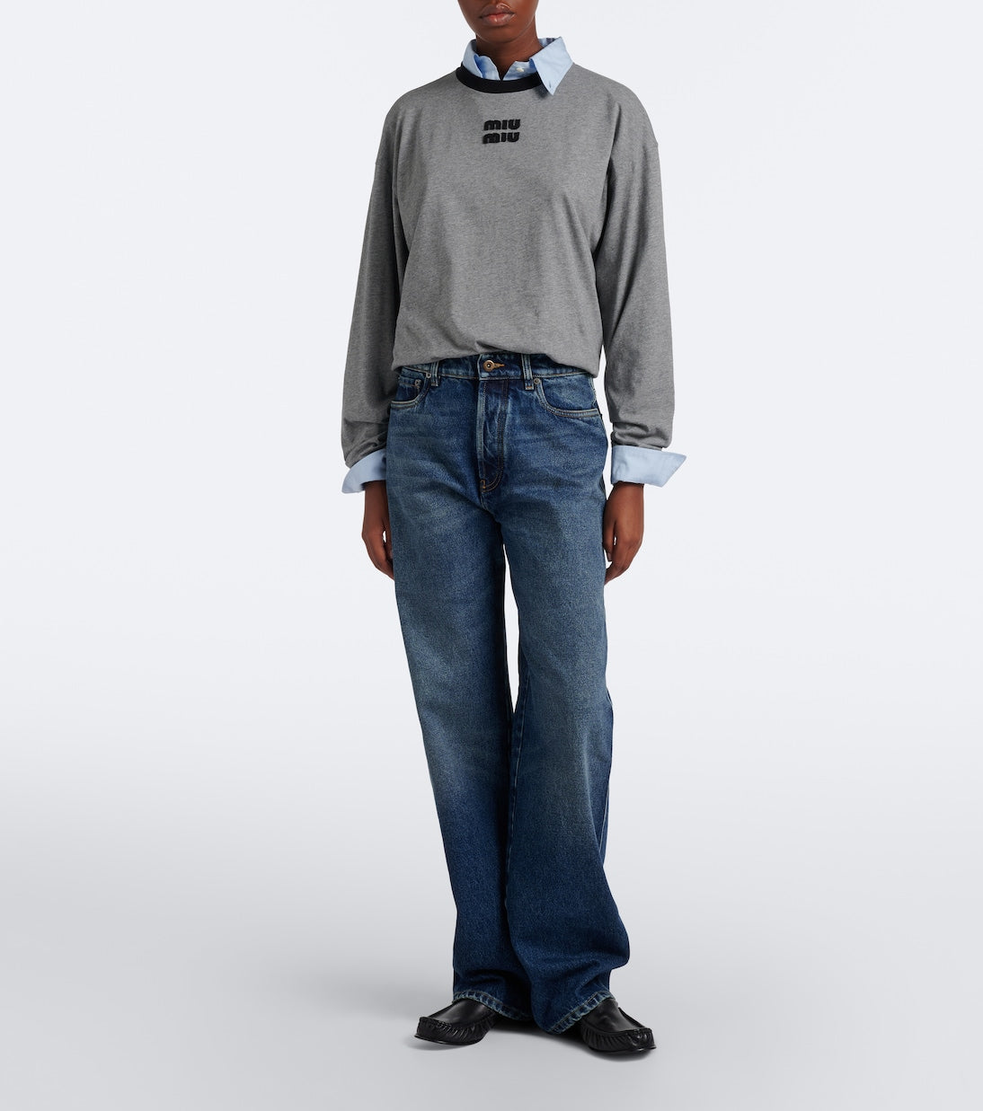 Miu Miu Oversized Cotton Jersey T-Shirt in grey, full-length model shot with a blue shirt and jeans