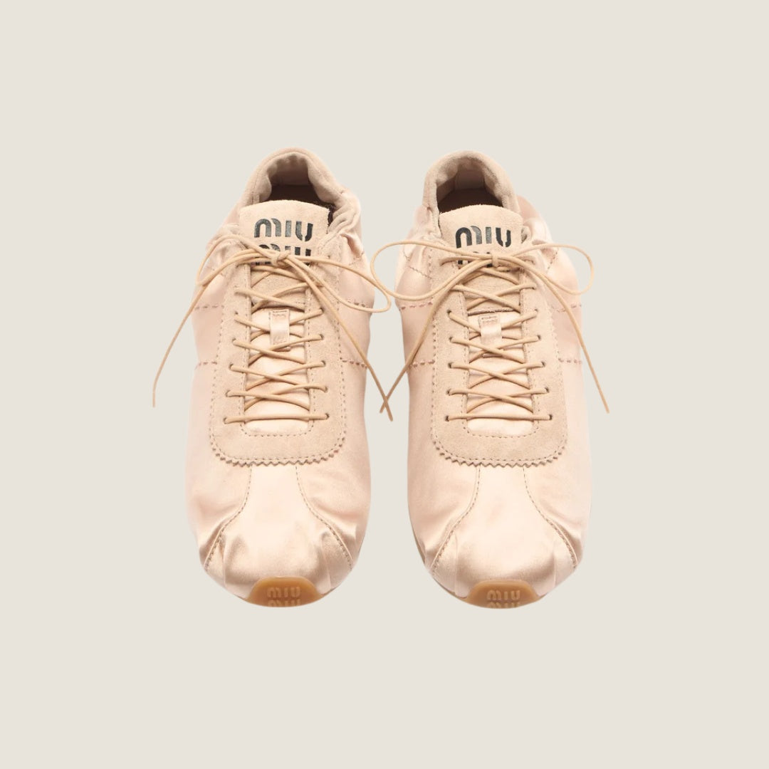 Miu Miu Plume satin sneaker in powder pink, top view — The Quiet Edition