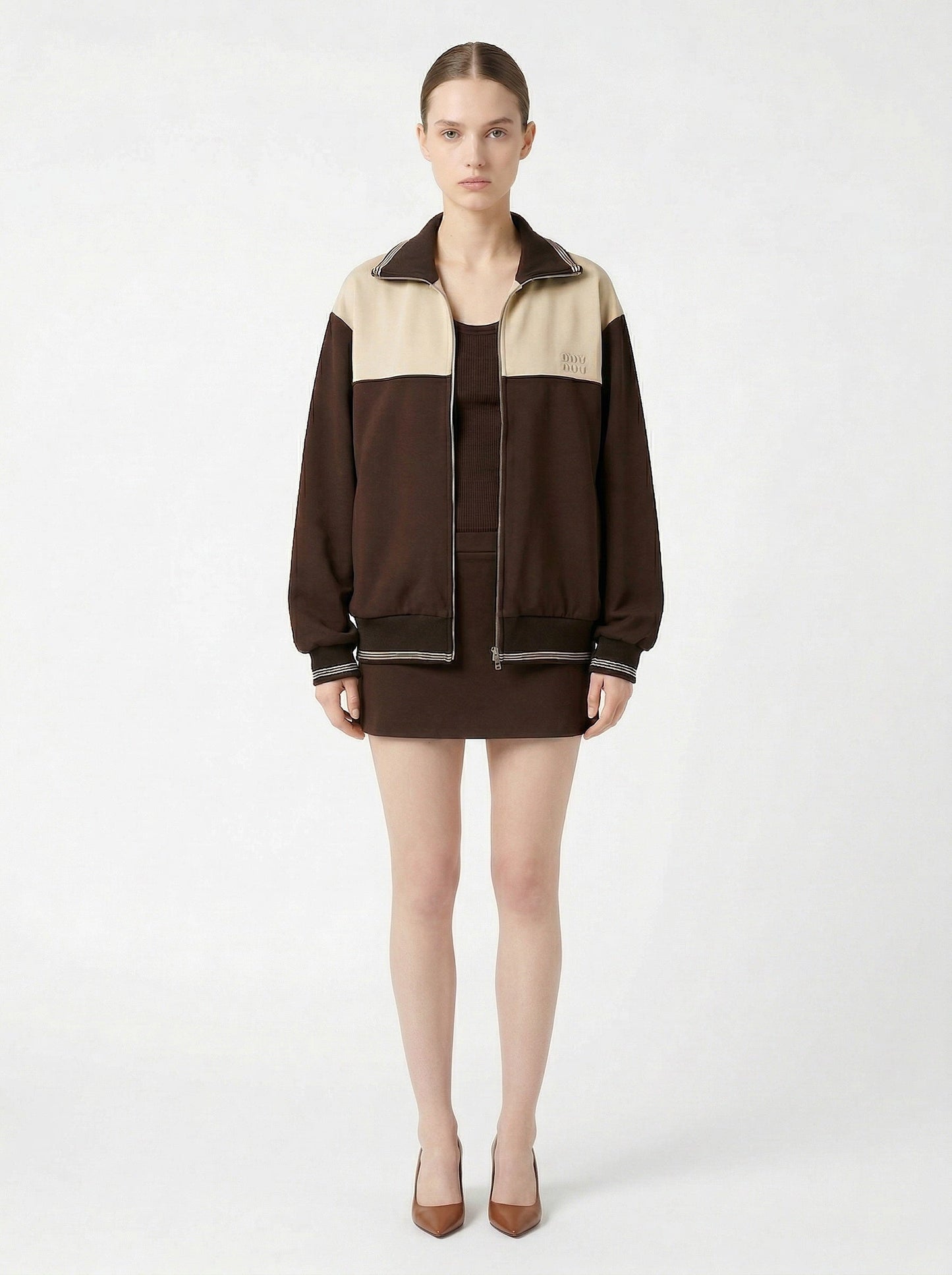 Miu Miu two-tone zip bomber jacket, model front — The Quiet Edition