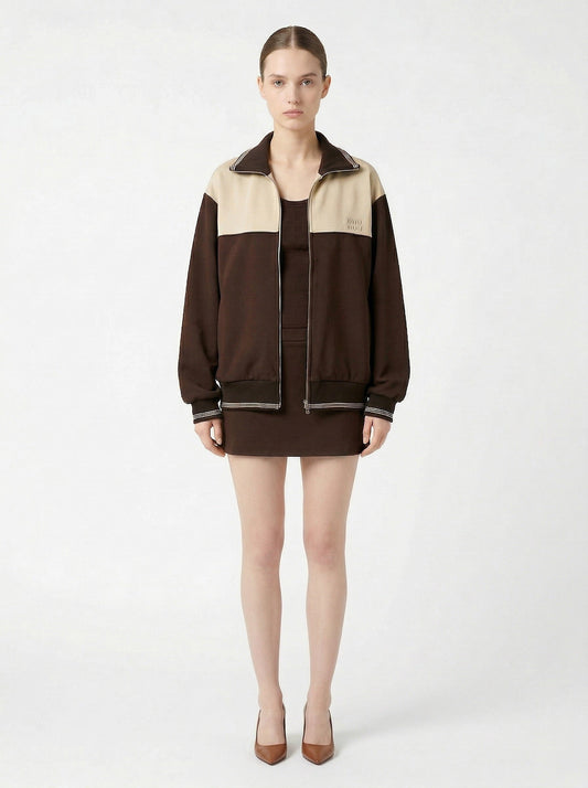 Miu Miu two-tone zip bomber jacket, model front — The Quiet Edition