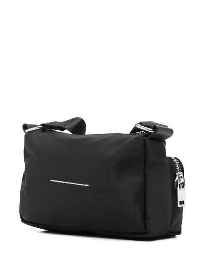 MM6 Maison Margiela Numbers-patch cross body bag in black, back view with stitched logo — The Quiet Edition