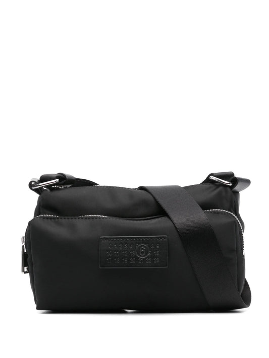 MM6 Maison Margiela Numbers-patch cross body bag in black, front view — The Quiet Edition