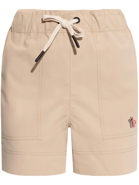Moncler Grenoble Logo-Embroidered Shorts in Beige, front — The Quiet Edition