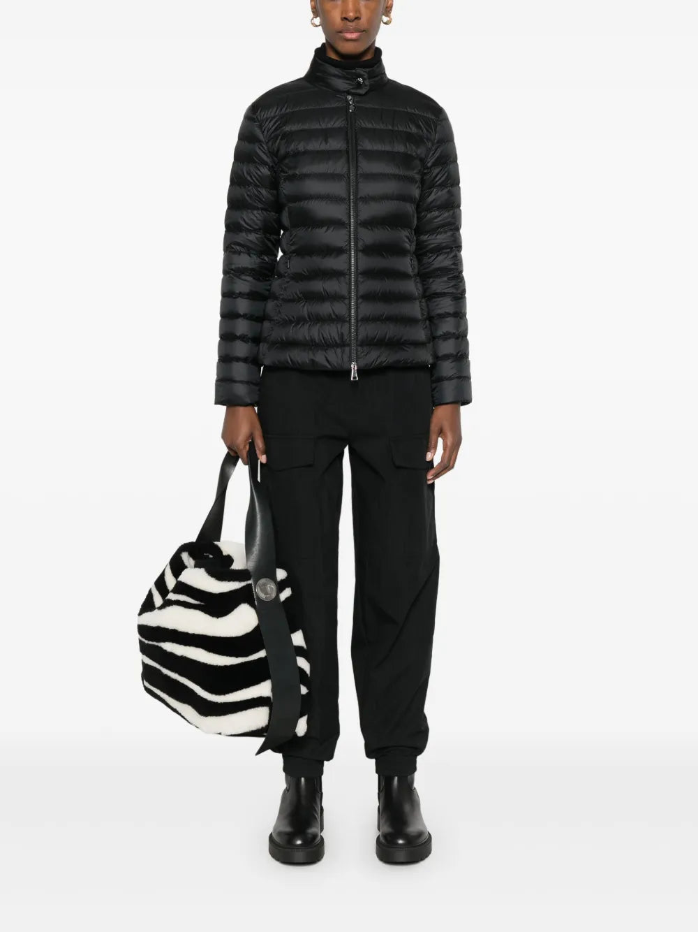 Moncler Igelle Quilted Down Jacket in black, worn full-length view | The Quiet Edition