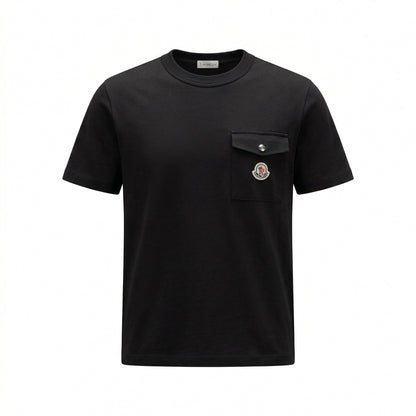 Moncler logo patch pocket t-shirt in black, front view — The Quiet Edition