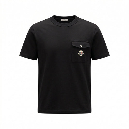 Moncler logo patch pocket t-shirt in black, front view — The Quiet Edition