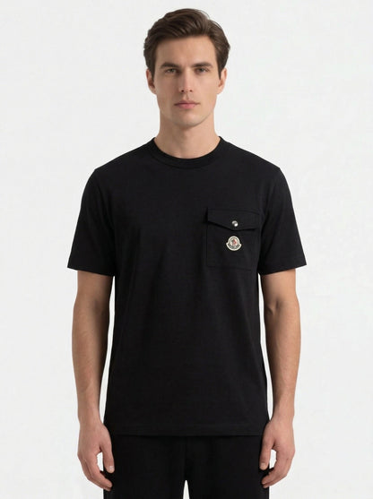 Moncler logo patch pocket t-shirt in black, model front — The Quiet Edition