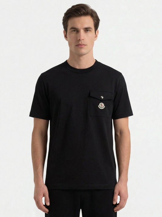 Moncler logo patch pocket t-shirt in black, model front — The Quiet Edition