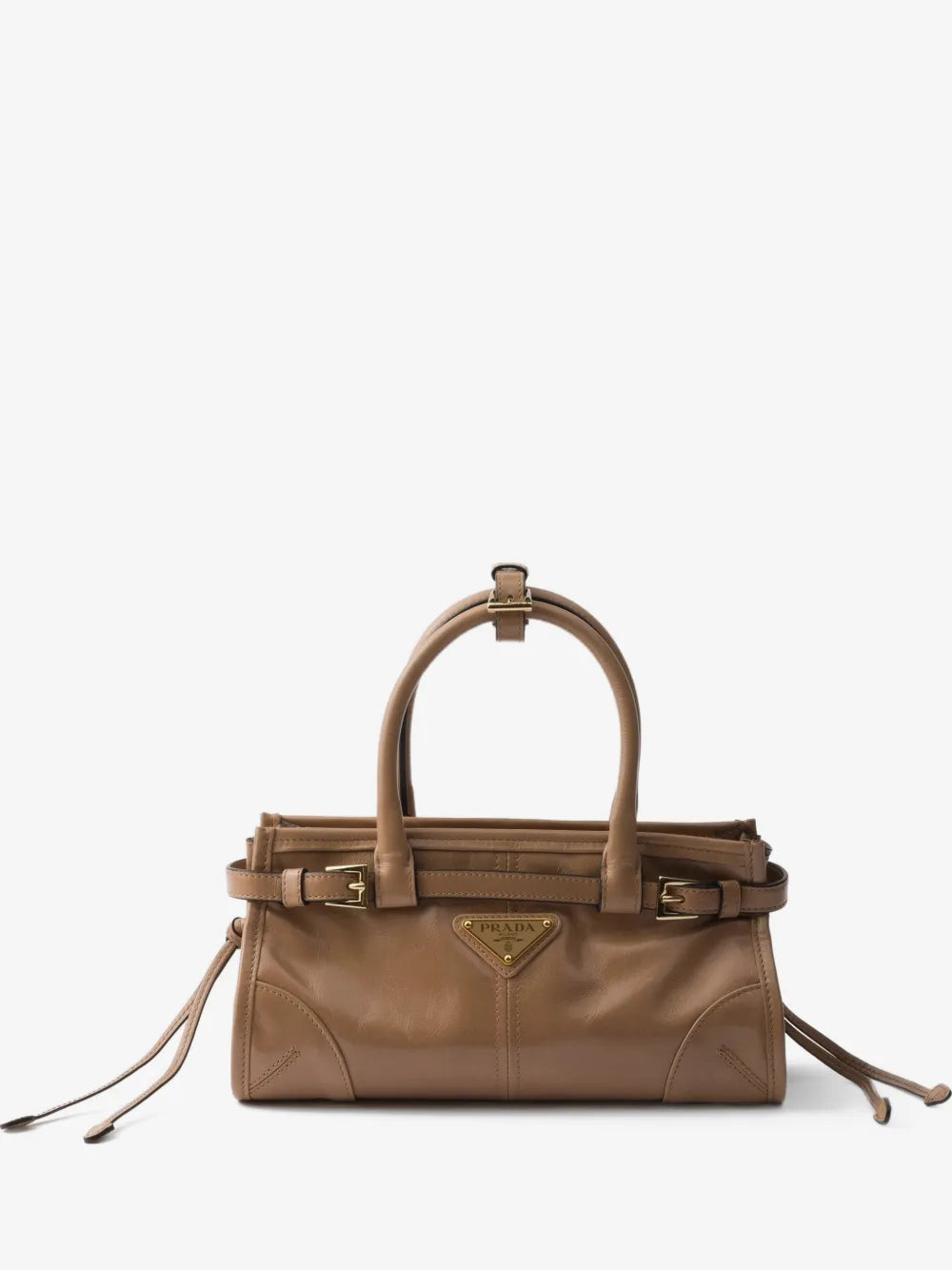 Prada Bonnie mini handbag in tan glossy leather, front view with gold buckles and triangle logo plaque