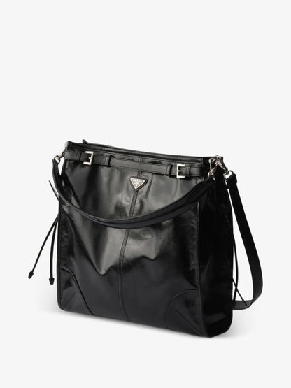 Prada Bonnie Leather Shoulder Bag in Black, three-quarter angle view — The Quiet Edition